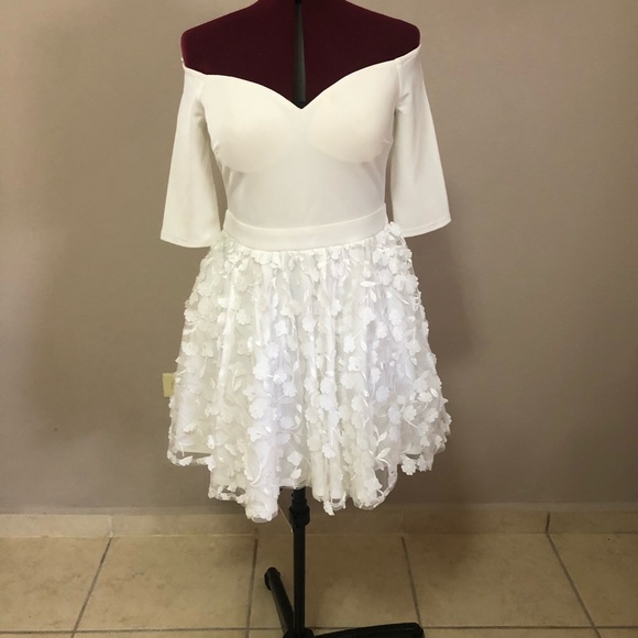 Dresses & Skirts - Off shoulder white mini dress.